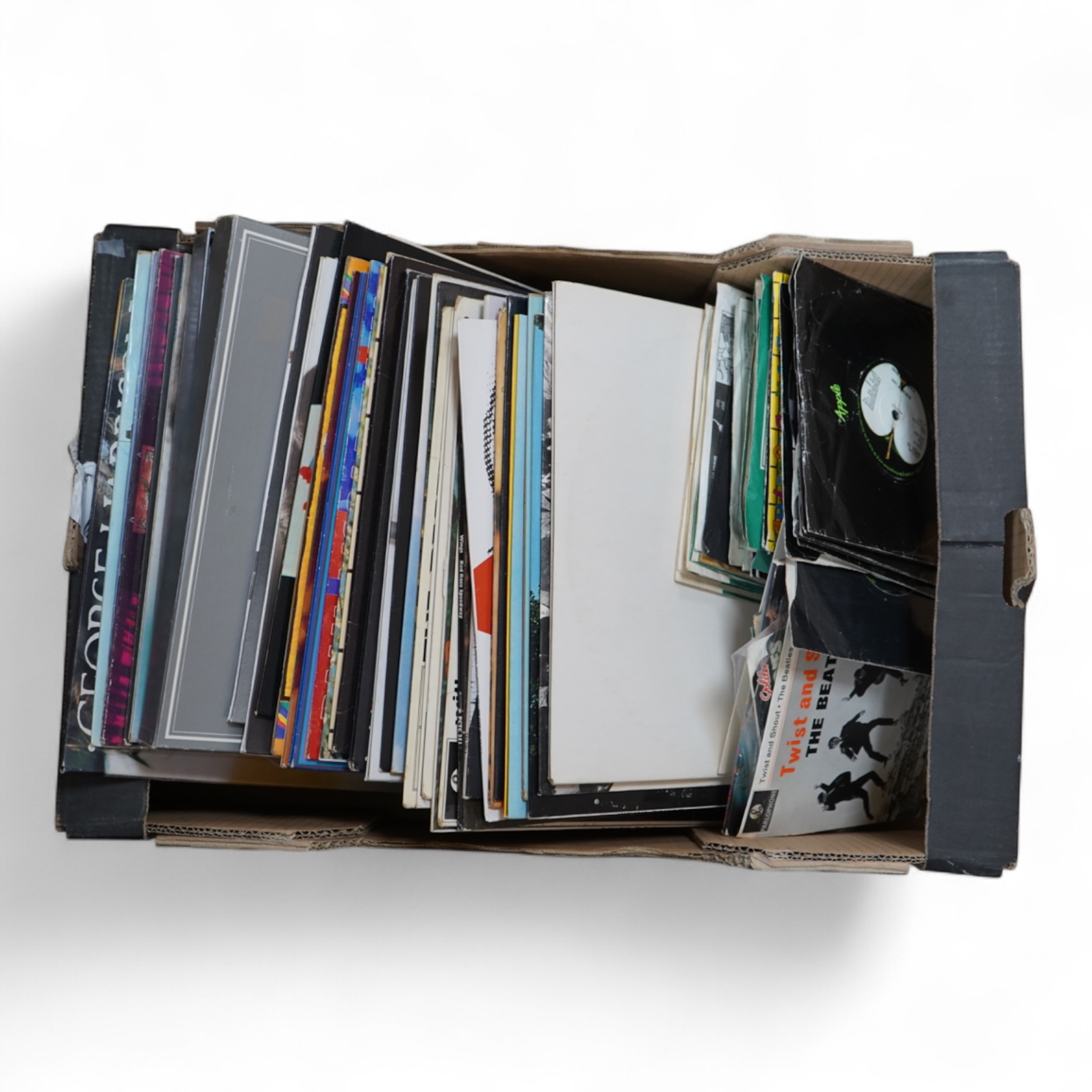 A collection of Beatles related LP's and singles, 36 LPs and a John Lennon box set, including; the ‘White Album’, a side loading issue, numbered 0111352, Revolver, Abbey Road, Sgt. Pepper, Let It Be, Beatles For Sale, Wi